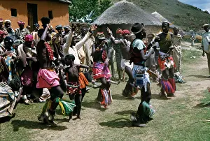 Enclaves: Villagers watching youth perform Sotho dance