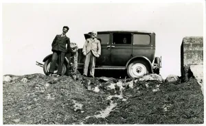 Appears: Vintage Car (appears to be a Renault)