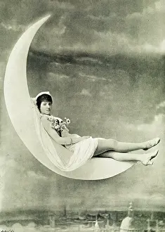 Reclining: Violet Friend, reclining on a crescent moon