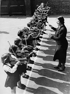 Schoolyard: Violin class in the school playground