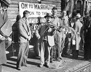Impoverished: Violin-playing farmer during the Great Depression, 1932