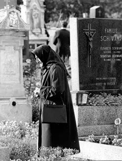 Graveyards: Visit to the cemetery on All Saints Day. An old