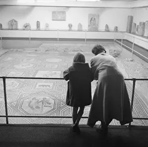 Germanisches: Two visitors are looking at the Dionysus