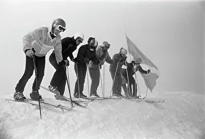 Skiers: On Top of Volcano