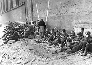 Arrows: Volunteers have a break during clearing work in Munich