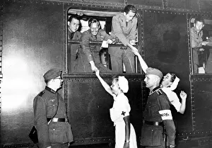 Gare: Volunteers from the Spanish Blue Division are greeted