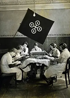 Embroidering: Volunteers at work in a camp of the Voluntary