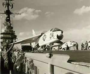 Catapult: Two Vought F8U Crusaders preparing to catapult off