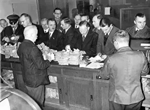 Packets: Wage money is collected from the Bank