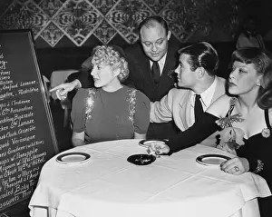 Menus: Waiter and customers in restaurant
