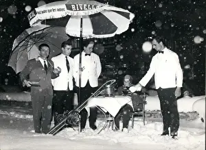 Hardly: Waiters in Davos, Switzerland, serving first guest