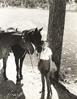 Jodphurs: Walking her horses by the lake