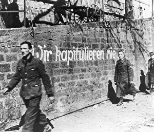 Determined: A wall in Germany painted with the slogan we will never