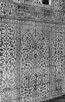 Tiling: Wall of Moorish tiles with Arabic writing