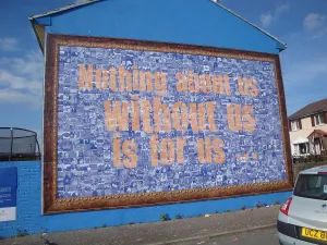 Wall mural close-up Nothing about us without us is for us