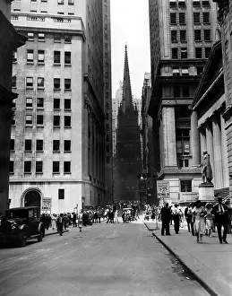 Cvpl: WALL STREET-Trinity Church in the background. ?