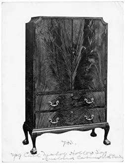 Drawers: A Walnut cabinet with drawers