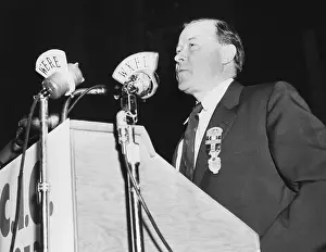 1044: Walter Reuther, opened the 15th convention of the