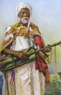 Tatters: Wandering Algerian musician