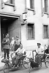 Wheelchair: Two war invalids visiting Adolf Hitler, 1933
