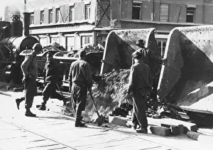 Clearance: War prisoners at rubble clearance work in Munich, 1945