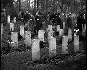 Graces: War Veterans Visit the Graces in a War Cemetery