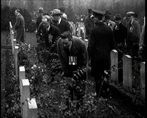 Graces: War Veterans Visit the Graces in a War Cemetery