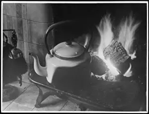 Coals: WARMING KETTLE BY FIRE
