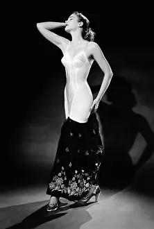 Boned: Warner corset provided full body control, ?