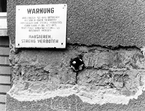 Decrepit: Warning sign at decrepit apartments of the US Army