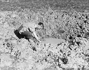 Cleanliness: Washing in a shell hole 1917
