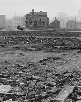 Wasteland: Waste ground with buildings in the distance