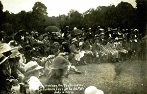 Umbrellas: Watching performance, garden fete, Charlton Park, London