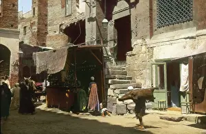 Stairways: Water carrier on a street in Cairo