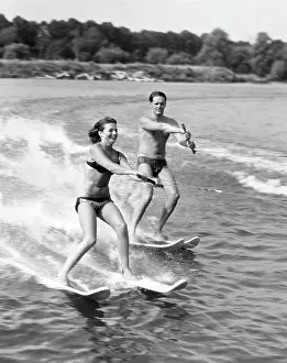 Waterskiing: WATERSKIING COUPLE