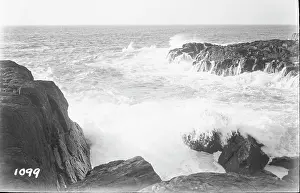 Foam: Waves Crashing on Rocky Shore