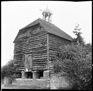 Granary: The weatherboarded granary at the entrance to