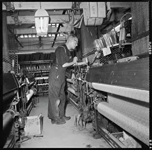 Cowling: A weaver operating a Jacquard power loom