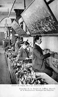 Weavers: Weavers working in a carpet factory
