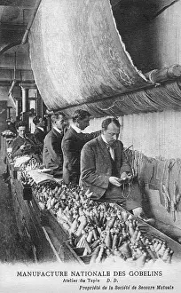 Weavers: Weavers working in a carpet factory