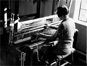 Weaves: WEAVING AT A LOOM