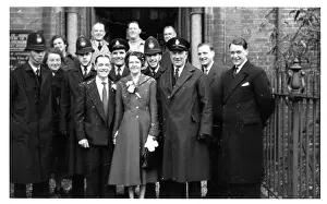 Railings: Wedding group with police officers