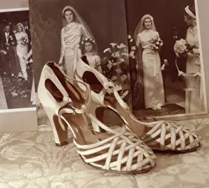 Bridesmaid: Wedding shoes and photographs