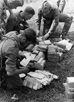 Pause: Wehrmacht soldiers sorting mail, 1941