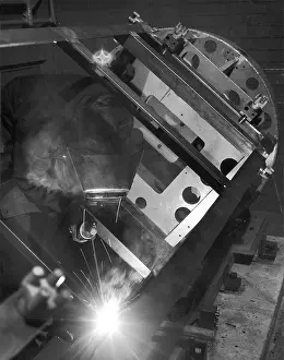 Zinram: Welder using an Oxyacetylene Torch