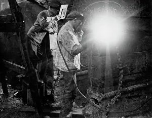 Welders: Welders at a shipyard