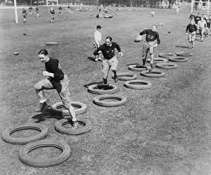 Padding: West Point's football squad high stepping through