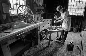 Wheelwright: Wheelwright makinbg wooden wheels, Blists Hill, Ironbridge