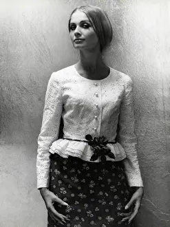 Chic: White blouse and dark floral pattern skirt