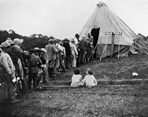 Encampments: White children in line for milk during the 1927
